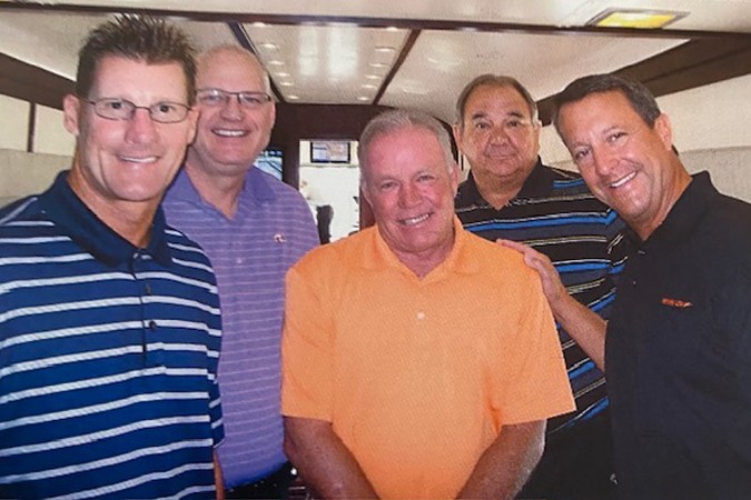 Pictured from left: Former BNSF executives Jeff Wright, Carl Ice, Jason’s father Danny Maxfield, Bob Lease and Greg Fox on Maxfield’s last day in 2012